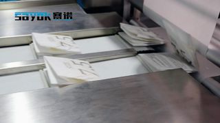Машина для упаковки двусторонних хирургических перчаток с четырехсторонним швом